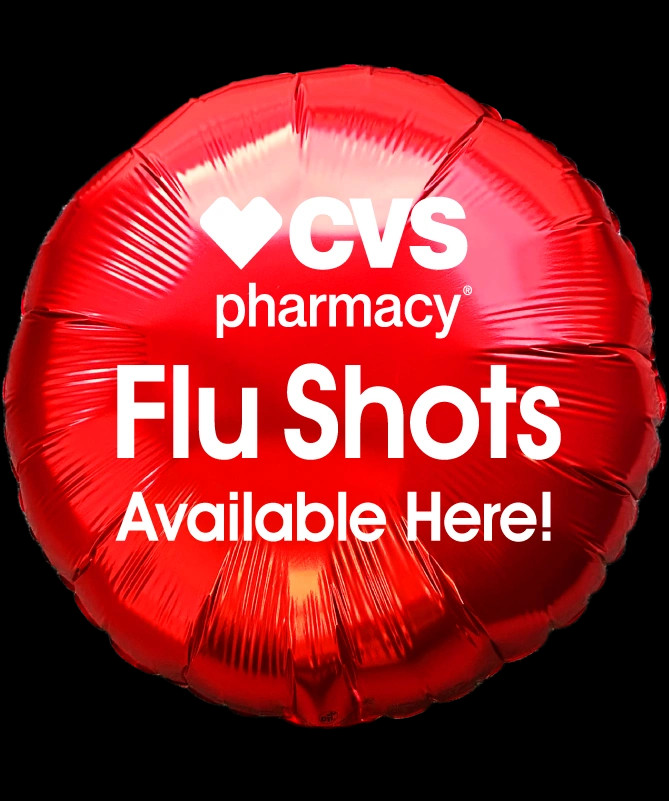Mylar balloon with text written - flu shots available here.